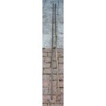 Two vintage brass petrol tank measuring poles, 305cm