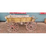 A farm cart, with artillery wheels wheels and shafts