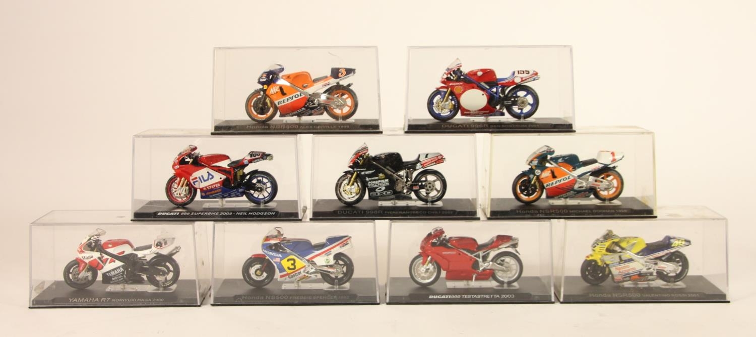 A collection of 9 model motorcycles