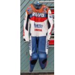 An Echt Ledr Honda Repsol one piece leather race suit, size XXL, with protectors