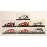 A collection of 7 boxed model rally cars