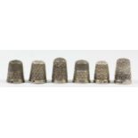 5 hallmarked silver thimbles and one Sterling Silver example, 29gm