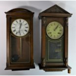 An early 20th Century painted porcelain mantle clock, deep blue & gold glazed with scrolling