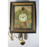 A mid 20th Century German mechanical picture frame wall clock, the face depicting scene of a hunter,