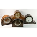 A collection of mid 20th Century and later mantle clocks, carriage clocks and barometers. (4)