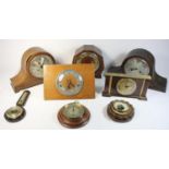 A collection of oak cased Westminster chime mantle clocks, together with wall barometers, wall