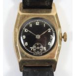 A 9ct rose gold gentleman's manual wind wristwatch, Chester 1938, the black enamel dial with