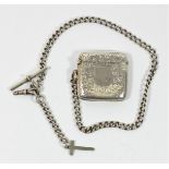 A silver vesta case, Birmingham 1910 with a silver watch chain, 58.5gm