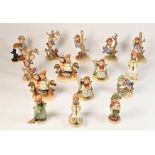 A collection of fifteen W. Goebel - Hummel figurines.