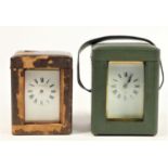 Two late 19th early 20th Century French carriage clocks, brass cased, white enamelled dials, with