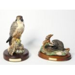 A Royal Doulton model of a badger 'The Wildlife Collection' DA8, on wood plinth, together with a