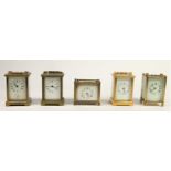 A collection of five manual wind brass cased carriage clocks. (all at fault)