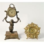 A British United Clock Co desk clock C1890s, crafted in ornate brass. 12cm tall, together with a