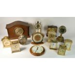 A collection of mid 20th Century & later clocks and barometers. (3)