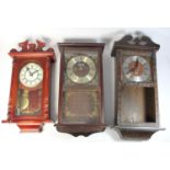 A collection of wall clocks, carriage clocks, anniversary clocks and barometers. (2)