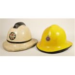 A Royal Air Force fire helmet, made by Cromwell , size 53-57, with interior cap and chin strap,