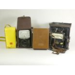 A collection of four electrical instruments, including a Cropico Type PW4, Weston Illumination Meter