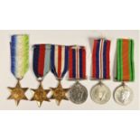 A group of six WWII medals, to include Atlantic Star, Defence and War and a mounted group of 1939-