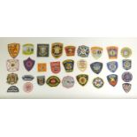 A collection of thirty one Emergency Service patches, consisting mainly of American Fire Departments