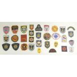 A collection of thirty one Emergency Service patches, consisting mainly of American Fire Departments