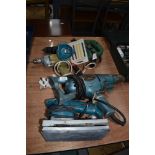 A selection of vintage electric hand tools including sander drill driver jigsaw etc