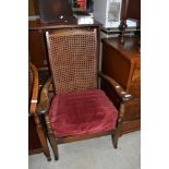 A traditional cane back armchair