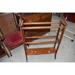 An early 20th Century mahogany and inlaid towel rail, probably Maple and Co, width approx. 73cm