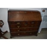 A period oak bureau, damage to back leg, bit rough around the edges but been a nice piece in its