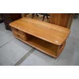 An Ercol coffee table, in the Minerva/Pandora style having double drawer base, dimensions approx.