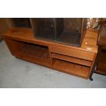 A vintage teak Hifi or TV stand, possibly G plan, or similar, with LP divisions to base, width