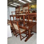 An Old Charm or similar refectory style dining table and six (four plus two) dining chairs