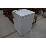 A small chest freezer, labelled 95L