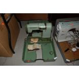 An Elna supermatic apple green sewing machine for haberdashery or dress making