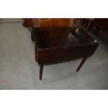 A 19th Century mahogany Pembroke style table, having frieze drawer and one dummy drawer, approx.