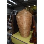 A traditional wicker work linen or snake charmers basket