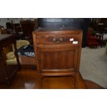 An early 20th Century bedside cabinet, height approx. 54cm