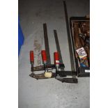 A selection of large clamps or grips