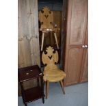 A pair of vintage pine shield back hall chairs