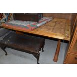 A vintage pine and tile top refectory table, approx. 140 x 79cm , with additional end leaf of 38cm