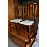 A pair of Edwardian mahogany and inlaid bedroom chairs having later Celtic style upholstered seats