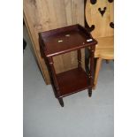 A modern mahogany effect bedside table