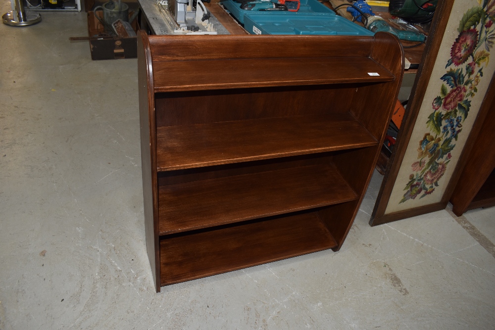 A mid 20th Century stained frame low bookshelf, width approx. 76cm