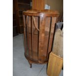 A mid 20th Century walnut bow fronted display cabinet, dimenstions approx. W74cm D34cm H125cm