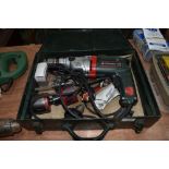 A Metabo cordless drill in metal case