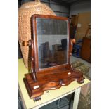 A Victorian mahogany toilet mirror on shaped base and scroll feet, width approx. 50cm