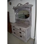 A ' shabby chic' mirror back small sideboard/dressing table having two over two drawers, width