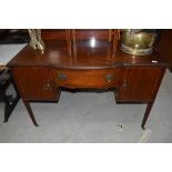 An Edwardian mahogany and inlaid dressing table, width approx. 120cm