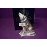 A Royal Crown Derby paperweight Wolf, boxed with a gold stopper