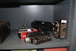 A selection of film recorders or cameras including magazine Cine Kodak and Quarz super 8mm