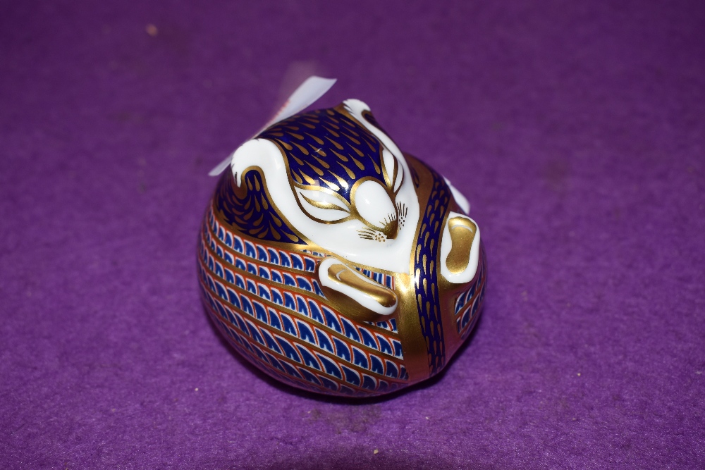 A Royal Crown Derby paperweight Sitting Dormouse with gold stopper